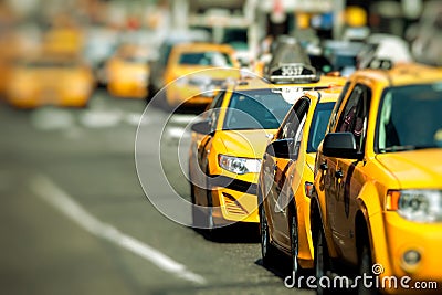 Yellow cab speeds through Times Square in New York, NY, USA. Editorial Stock Photo