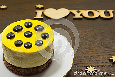 Yellow cake with brown drops Stock Photo