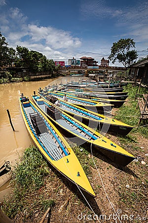 Yellow canoe boats. Inle Boat Station in Inle Nyaung Shwe Canal. Editorial Stock Photo
