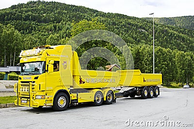 Yellow cargo truck with a trailer Editorial Stock Photo