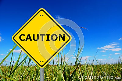 Yellow caution sign Stock Photo