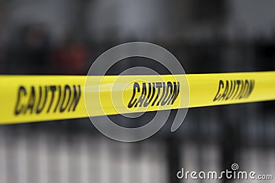 Yellow Caution Tape Stock Photo