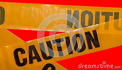 Yellow caution tapes crossing. Isolated. Red background Stock Photo