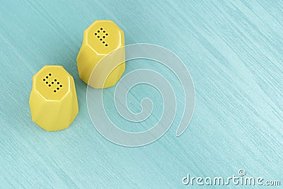 Yellow salt and pepper shakers Stock Photo