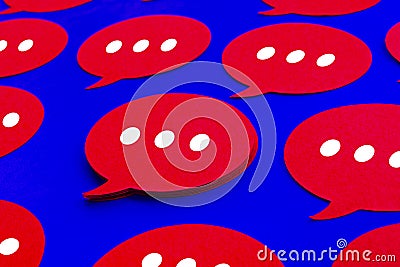 Yellow chat,speech bubble icons on blue color background.Talking and message for social media concepts Stock Photo