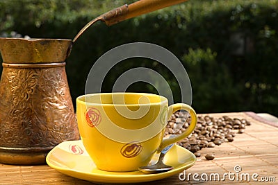 Yellow coffee cup Stock Photo