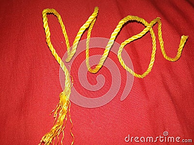 Yellow coloured plastic thin rope. Stock Photo