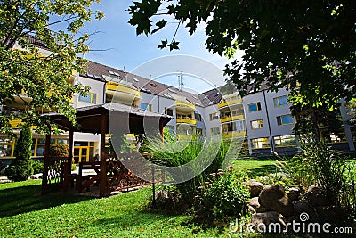 Yellow complex of residential house - Block of flats - Park in backyard Stock Photo