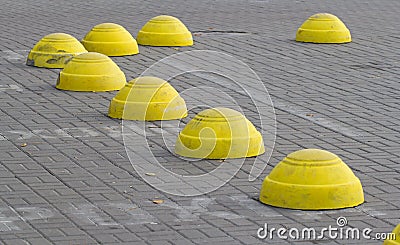 Yellow concrete hemispheres Stock Photo