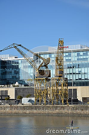 yellow crane at puerto madero Editorial Stock Photo