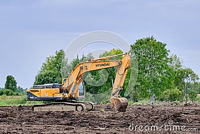 Yellow crawler excavator Hyundai Editorial Stock Photo