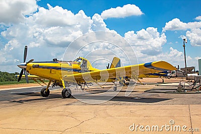 A yellow crop duster plane Stock Photo