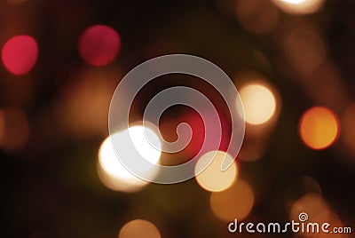 yellow, dark and red background with christmas lights in boken Stock Photo