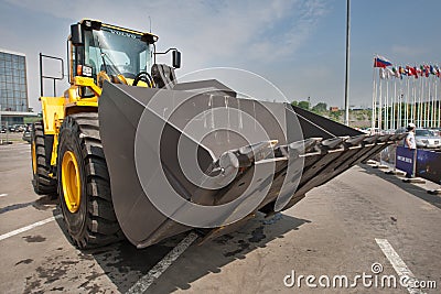 Yellow diesel front end loader on display Editorial Stock Photo