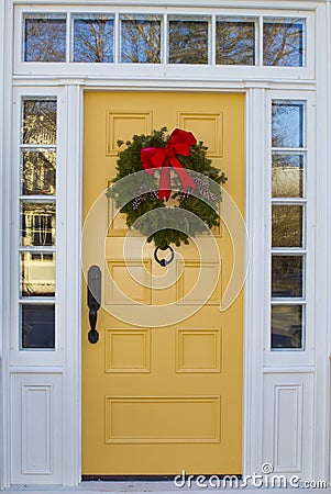 Yellow Door with Wreath Stock Photo
