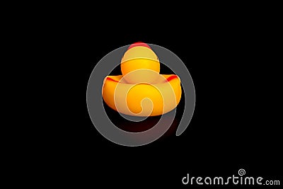 Yellow duck is located back. abstraction black background thinking the reasoning thought of the concept Stock Photo