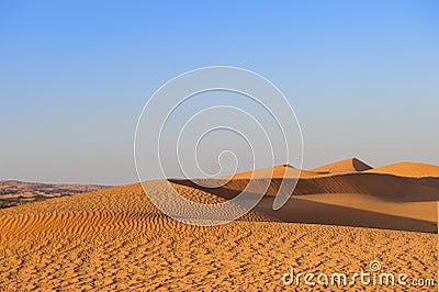 Yellow Dunes on suunset desert, Sharjah,UAE Stock Photo