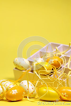 Yellow Easter eggs with a box Stock Photo