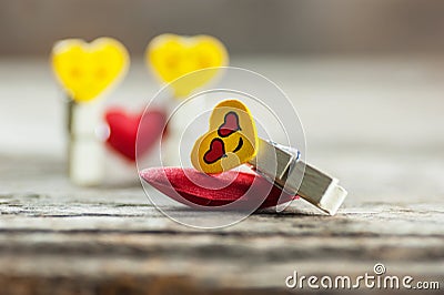 Yellow emoticon fall in love in a dream. Happy valentines day Stock Photo