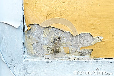 yellow erode painted concrete wall,grunge rough texture background Stock Photo