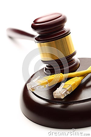 Yellow ethernet cable and gavel Stock Photo