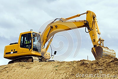 Yellow excavator machine Stock Photo