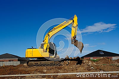 Yellow Excavator At Work Stock Photo