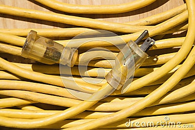 Yellow extension cord. Stock Photo