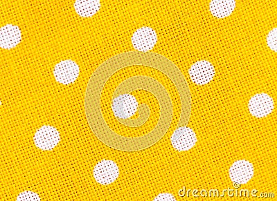 Yellow fabric texture with white polka dots Stock Photo