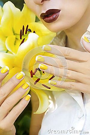 Yellow French manicure. Stock Photo