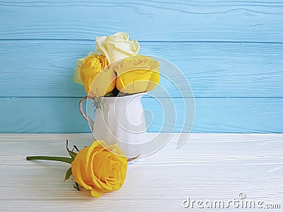 Yellow fresh rose vase vintage wooden background frame nature greeting decoration Stock Photo