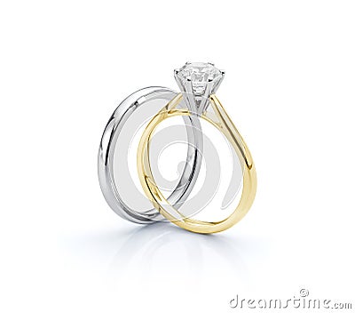 Yellow Gold Solitaire Engagement Ring and White Gold Wedding Ring Stock Photo