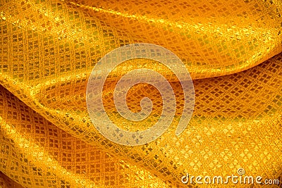 Yellow Gold Thai Fabric woven background Texture Stock Photo