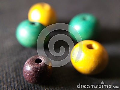 yellow green brown wood beads Stock Photo