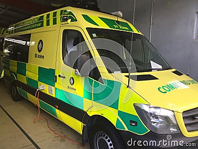 Yellow and green St. John Ambulance vehicle Editorial Stock Photo