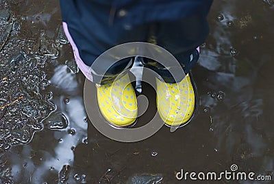 Yellow gumboots Stock Photo