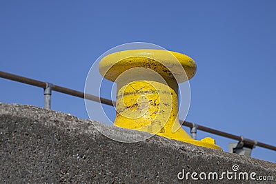 Yellow harbour cleat, England Stock Photo