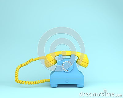 Yellow headphone against blue retro telephone on light blue colo Stock Photo