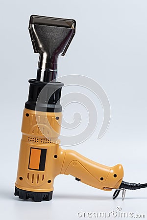 Yellow heat gun Stock Photo