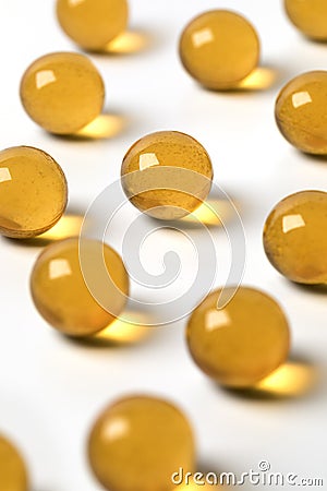 Yellow honey pearls close up Stock Photo