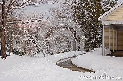 Winter Home and Yard Scene covered with Snow Stock Photo