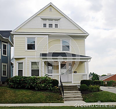 Yellow House on Hill Stock Photo