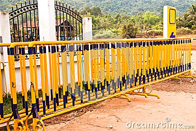 Yellow iron fence. Stock Photo