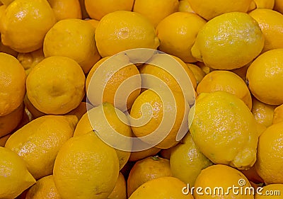 Yellow juicy lemons sour fruit source of vitamins bright pattern design culinary base dessert cocktails Stock Photo