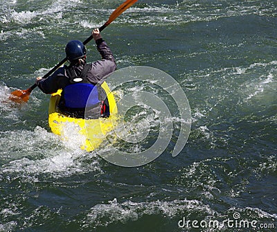 Yellow Kayak On The River Stock Photo