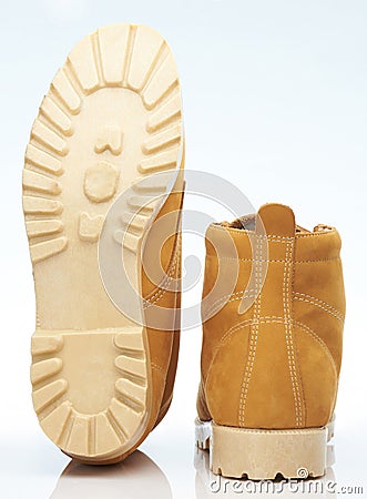 Yellow leather hiking shoes Stock Photo