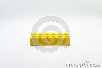 Yellow lego brick or block isolated on white background Stock Photo