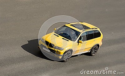 Yellow luxury car suv speed Stock Photo