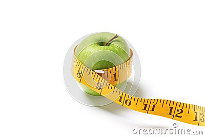 Yellow meter with apple Stock Photo