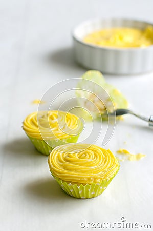 Yellow mini cupcakes Stock Photo